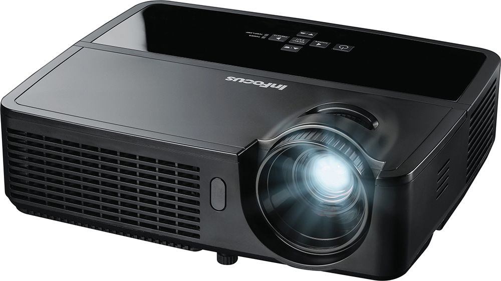  A black InFocus projector with a bright light shining out of the lens.